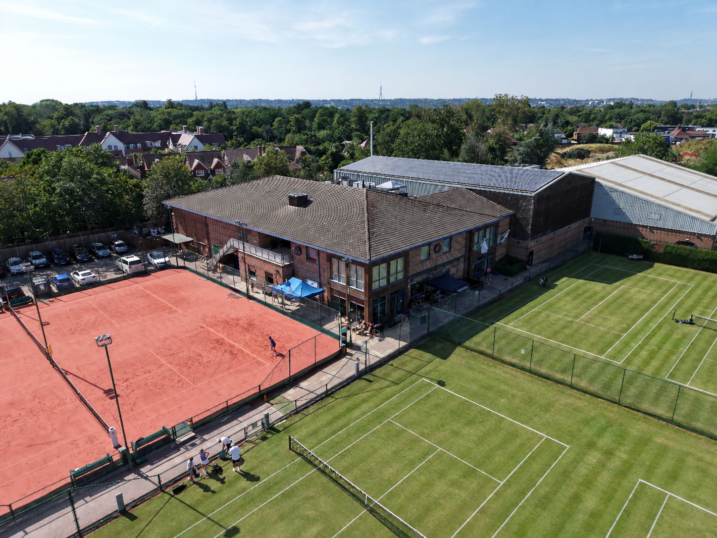 Aerial view of The Parklangley Club clubhouse and tennis courts