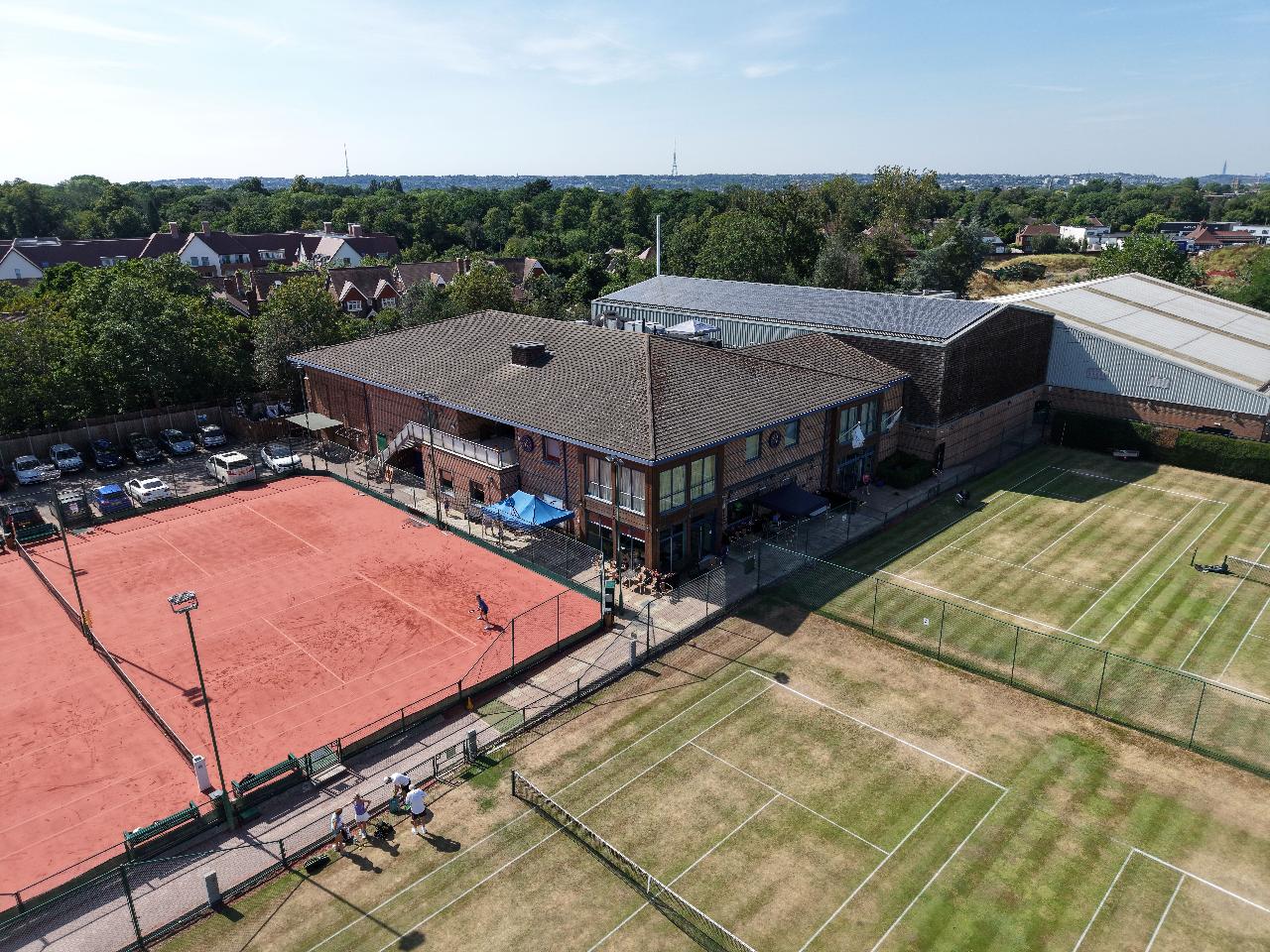 Aerial view of The Parklangley Club clubhouse and tennis courts