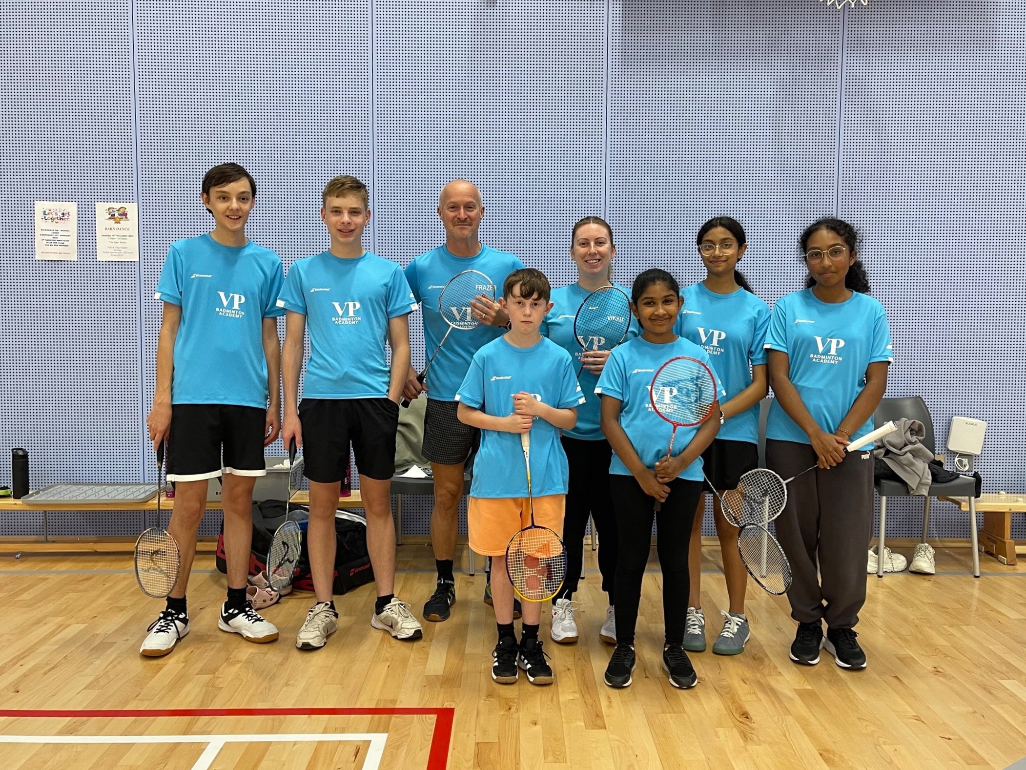 VP academy players and coaches together in the sports hall