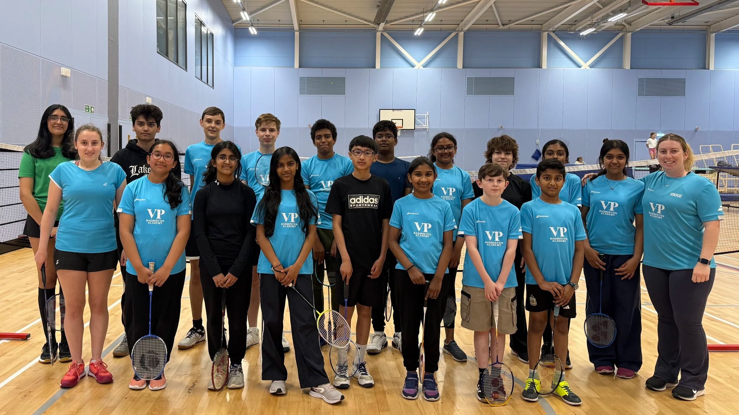 VP Badminton Academy squad gathered together on court